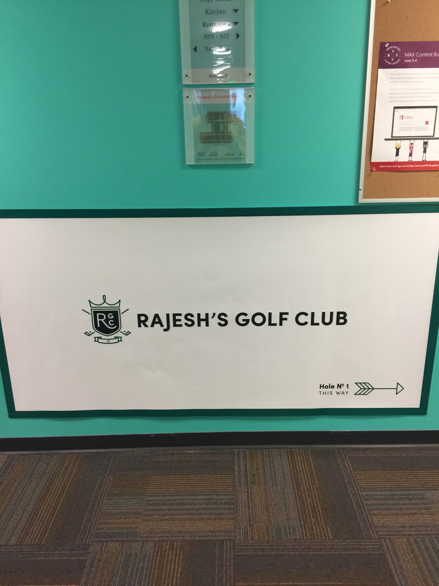 Rajesh's Golf Club sign on a hallway wall pointing to Hole No. 1